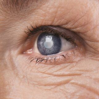 Senior woman face with wrinkles, closeup